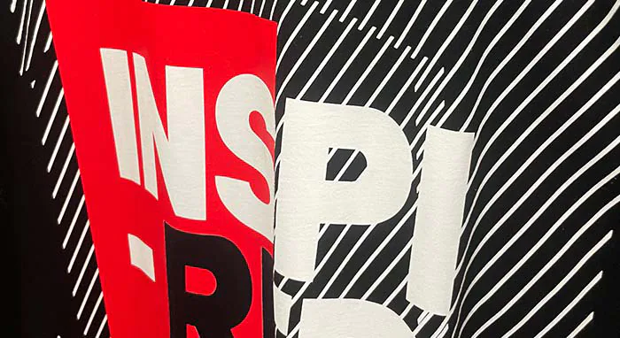 Bold graphic design on a custom screenprinted t-shirt, featuring high-contrast text and patterns – Custom Apparel, Screenprinting, and Embroidery for personalized designs in Los Angeles.